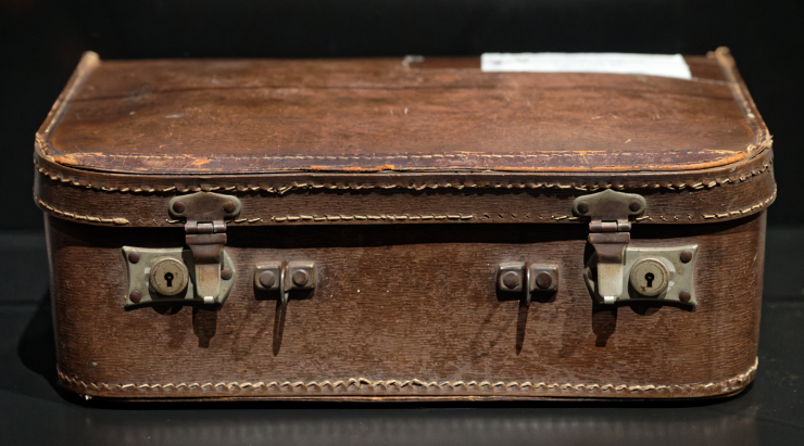 Suitcase used by the Lubelski family as they escaped occupied Poland in 1939. It carried a bible, bandages, family photographs, tea and sugar, plus an alcohol burner to heat water.